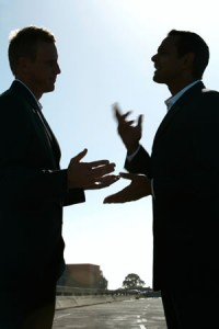 arguing businessmen selling a business